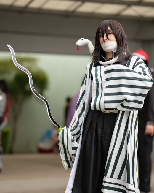 Anime cosplay enthusiast in costume at an outdoor event in San José, Costa Rica.