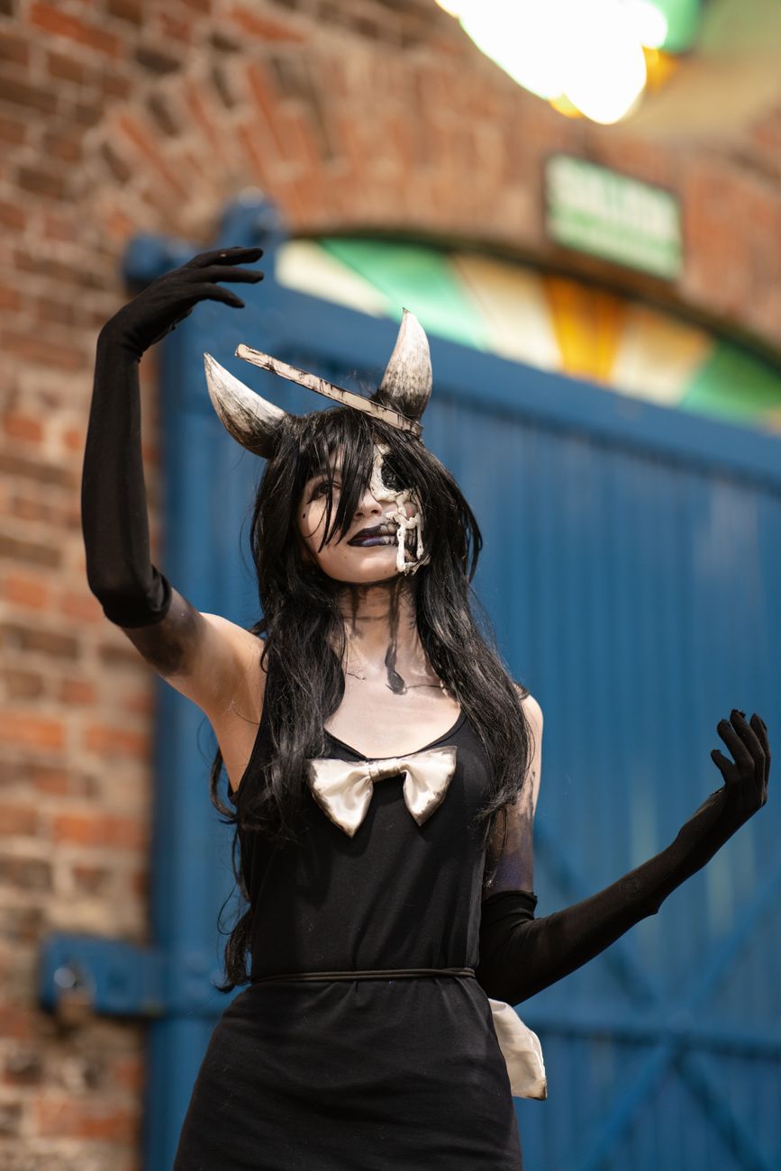 A captivating artistic anime cosplay performance in San José, Costa Rica, outdoors with gothic style.. pexels, captivating, a