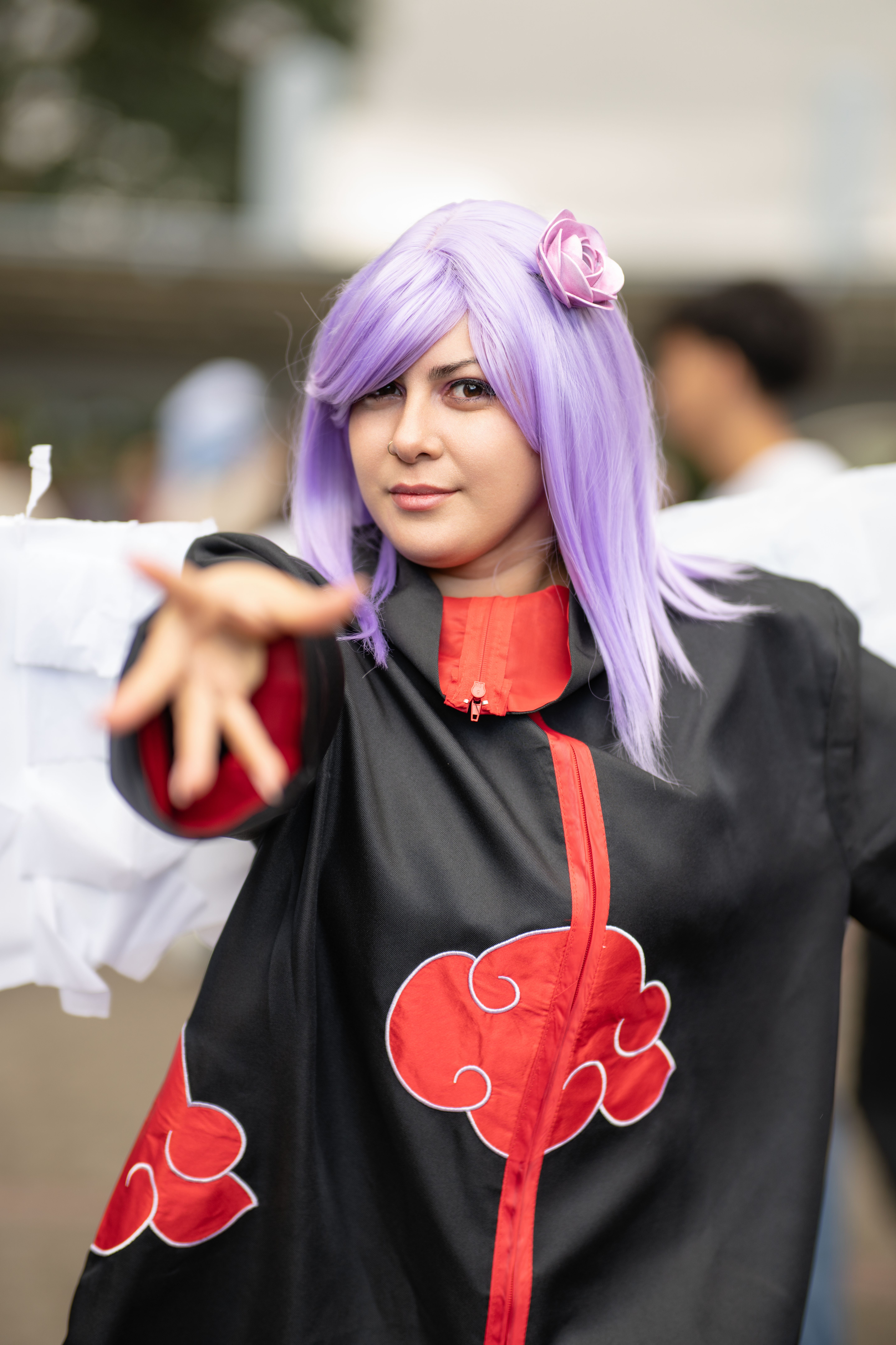 Anime cosplayer with purple hair in San José, Costa Rica. Vibrant and artistic.