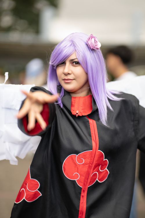 Free Anime cosplayer with purple hair in San José, Costa Rica. Vibrant and artistic. Stock Photo