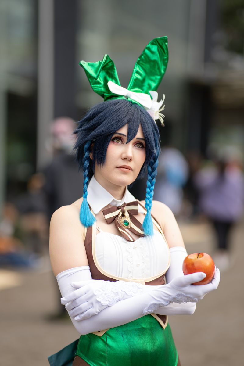 Anime cosplay enthusiast in vibrant costume at a San José cosplay event.