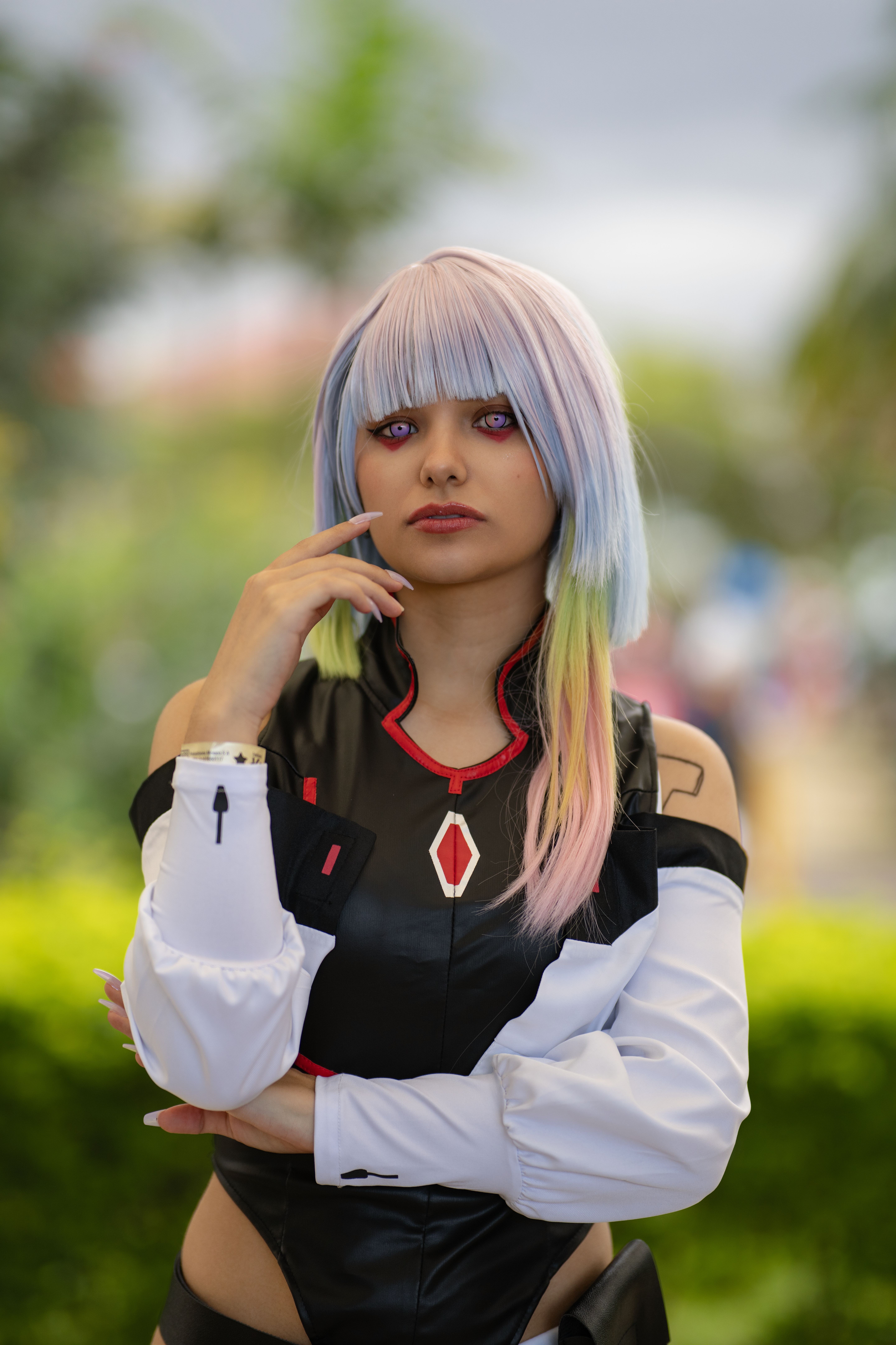 Colorful anime-inspired female cosplay character outdoors in San José, Costa Rica.