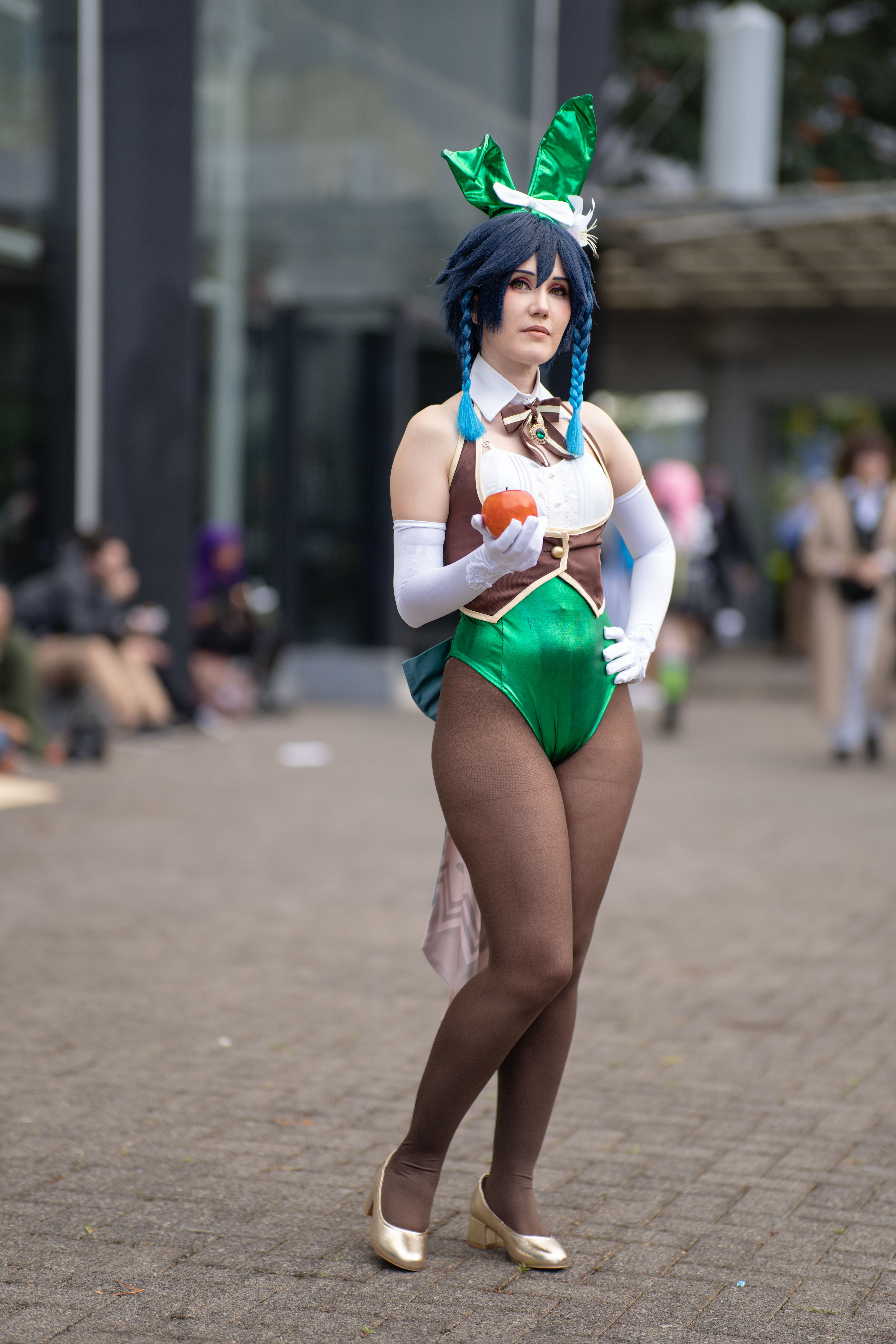 Vibrant anime cosplay character posing outdoors at a convention in San José, Costa Rica.