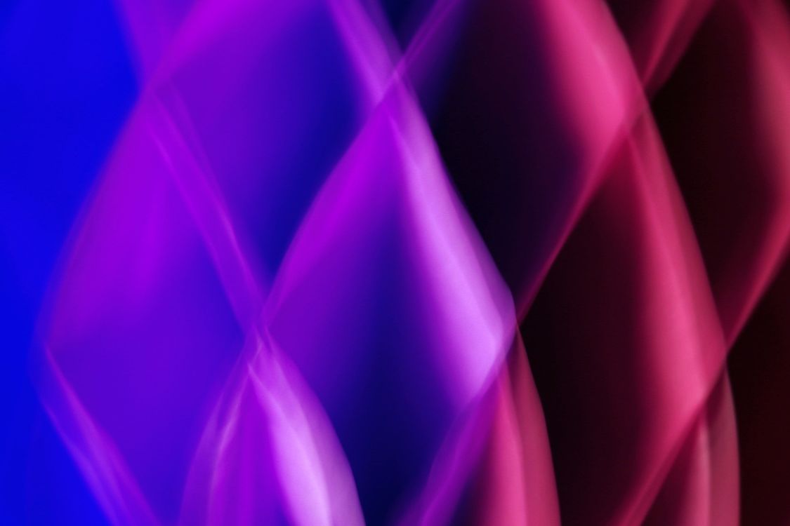 Vibrant Abstract Light Patterns in Purple and Blue · Free Stock Photo