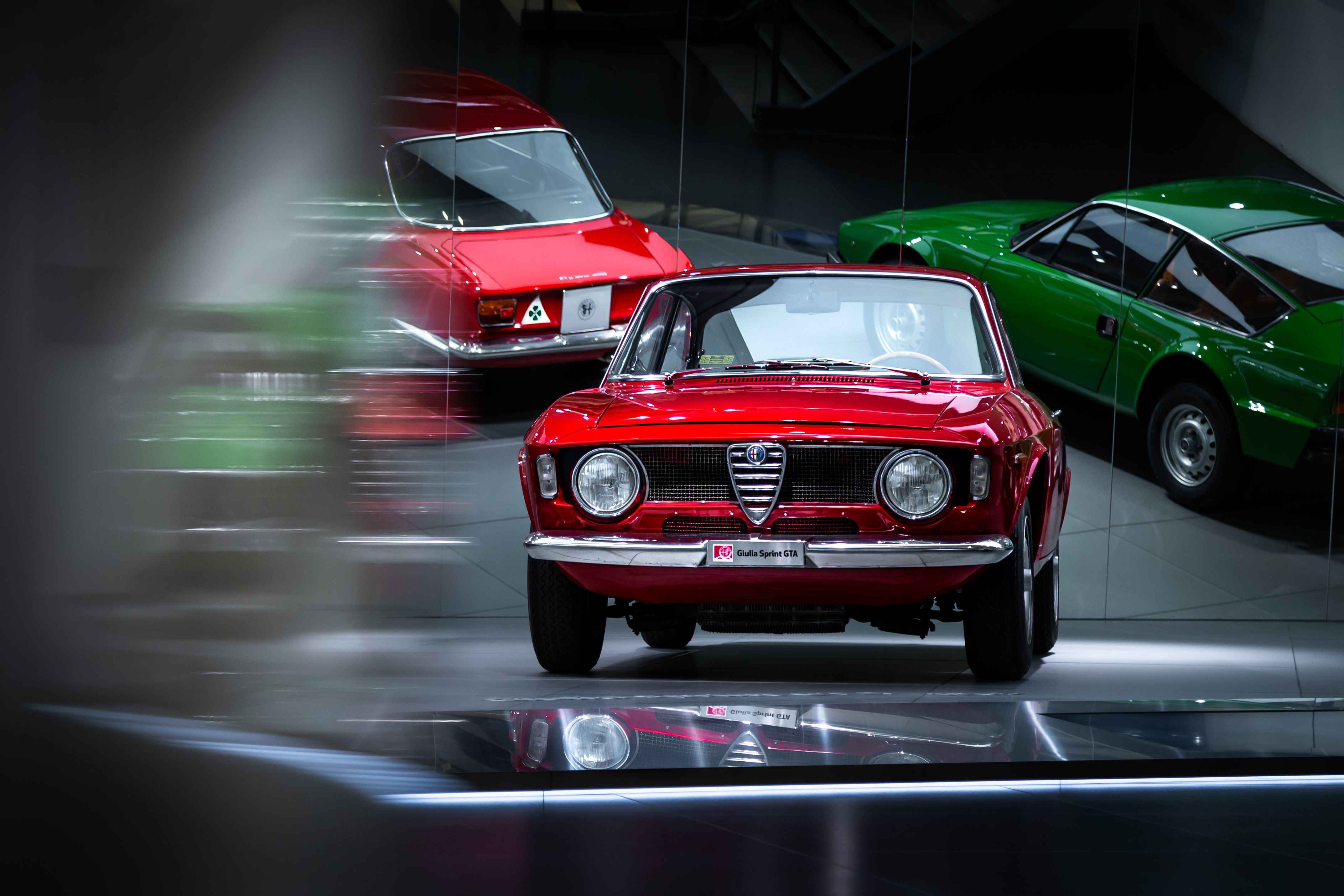 Classic Red Alfa Romeo in Museum Display · Free Stock Photo