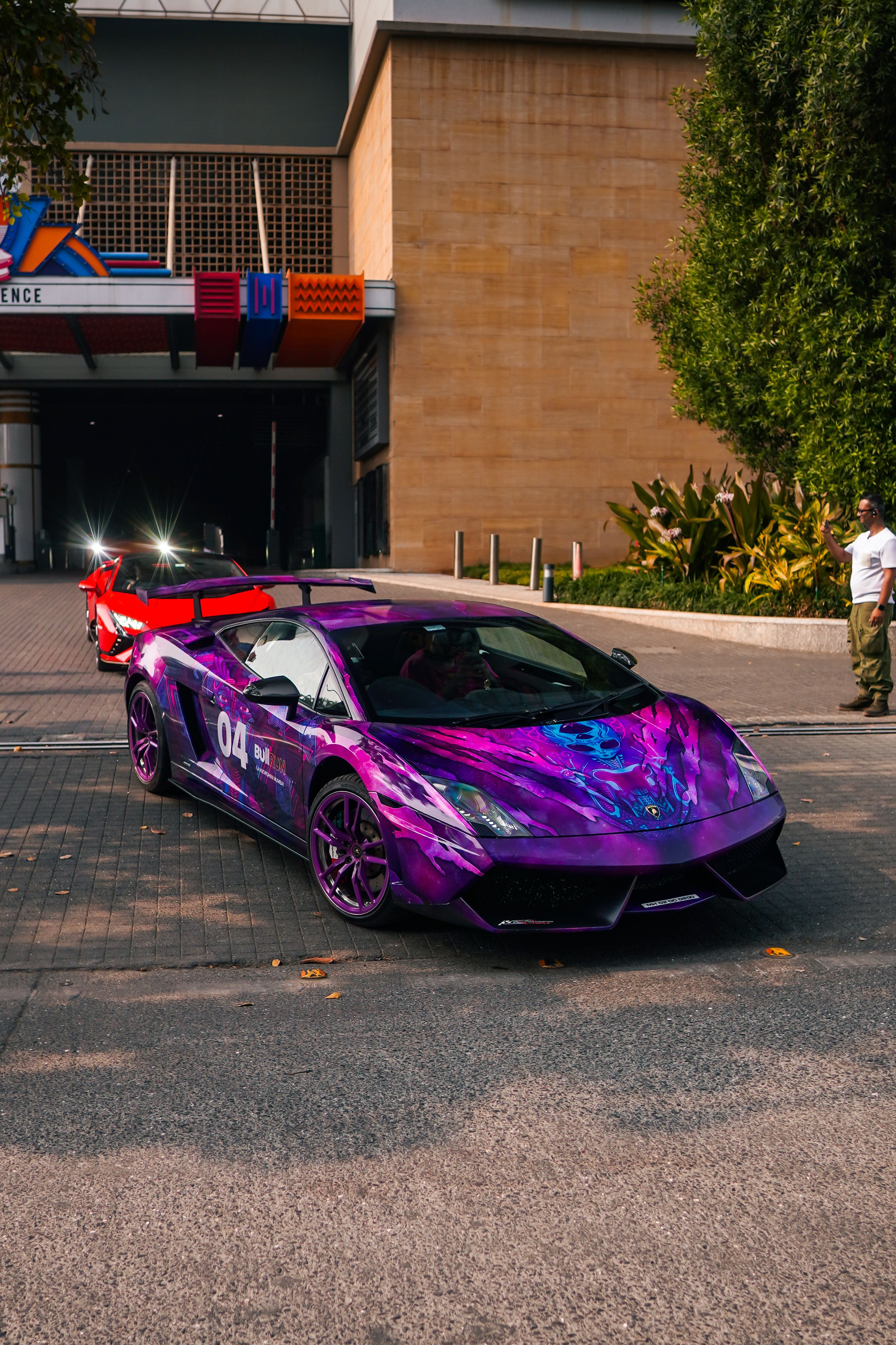 Vibrant Purple Sports Car on Urban Street · Free Stock Photo