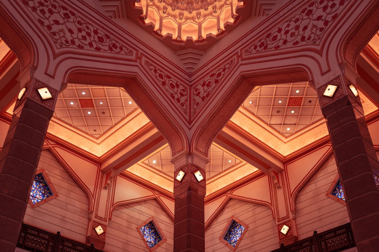 explore the intricate islamic architecture of putra mosque in malaysia