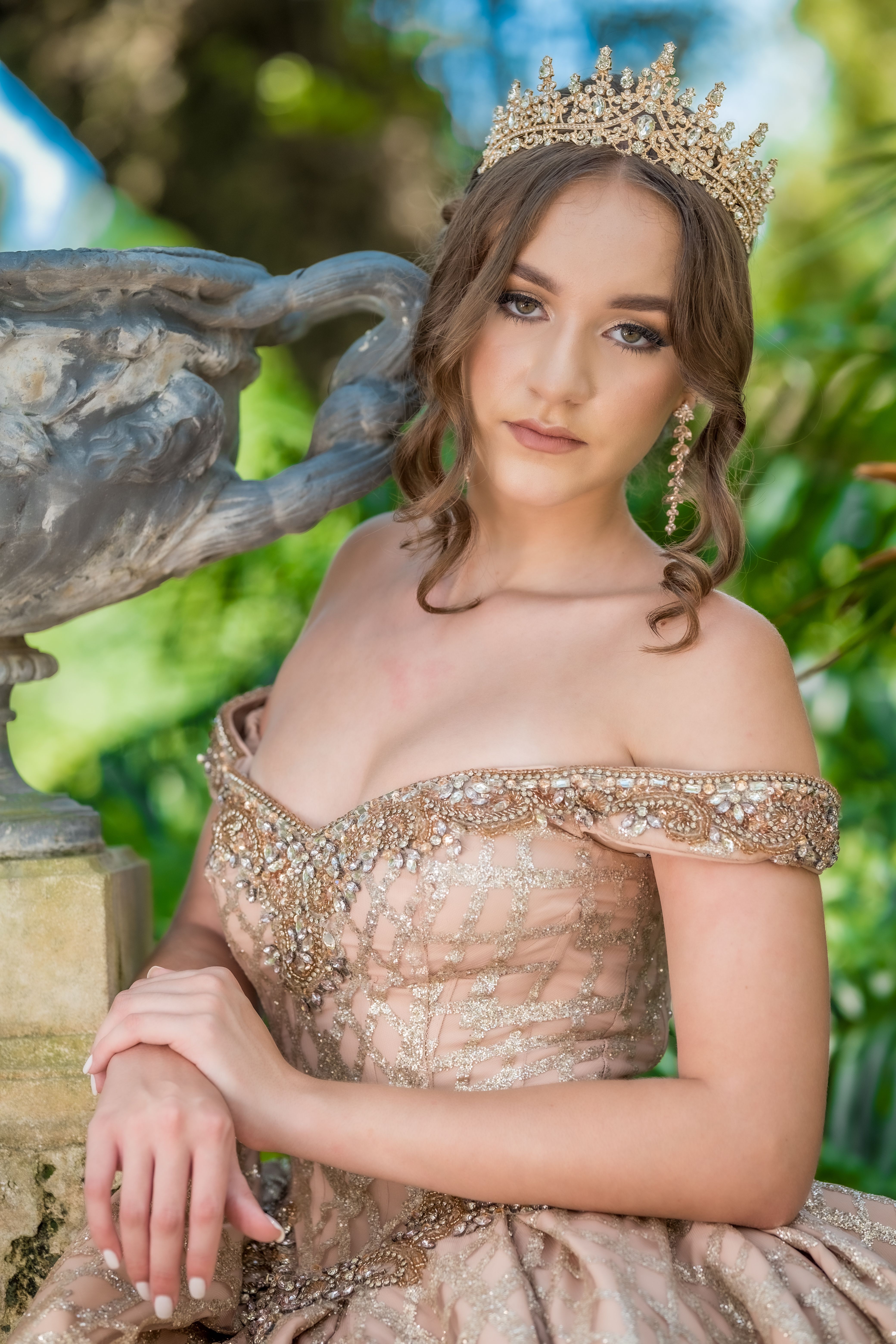 Elegant Woman in Ornate Gown and Crown · Free Stock Photo