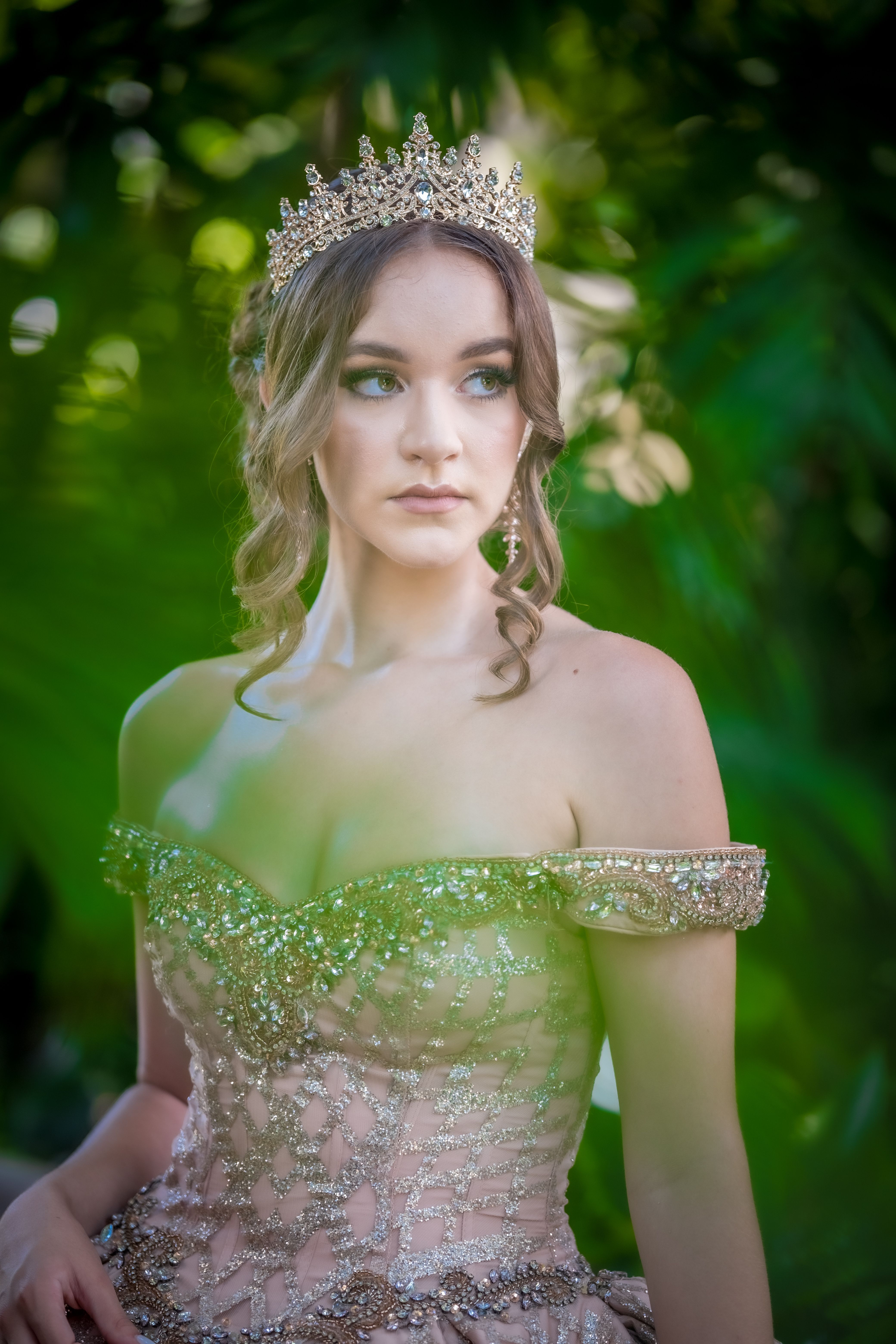 Elegant Portrait of a Woman in a Sparkling Gown · Free Stock Photo