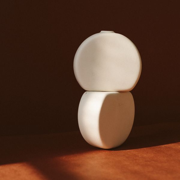 Minimal matte-glazed ceramic vase by Tiarra Sorte on Pexels
