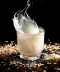 Oat milk splashing in a glass, photo by Gerardo Pantoja on Pexels