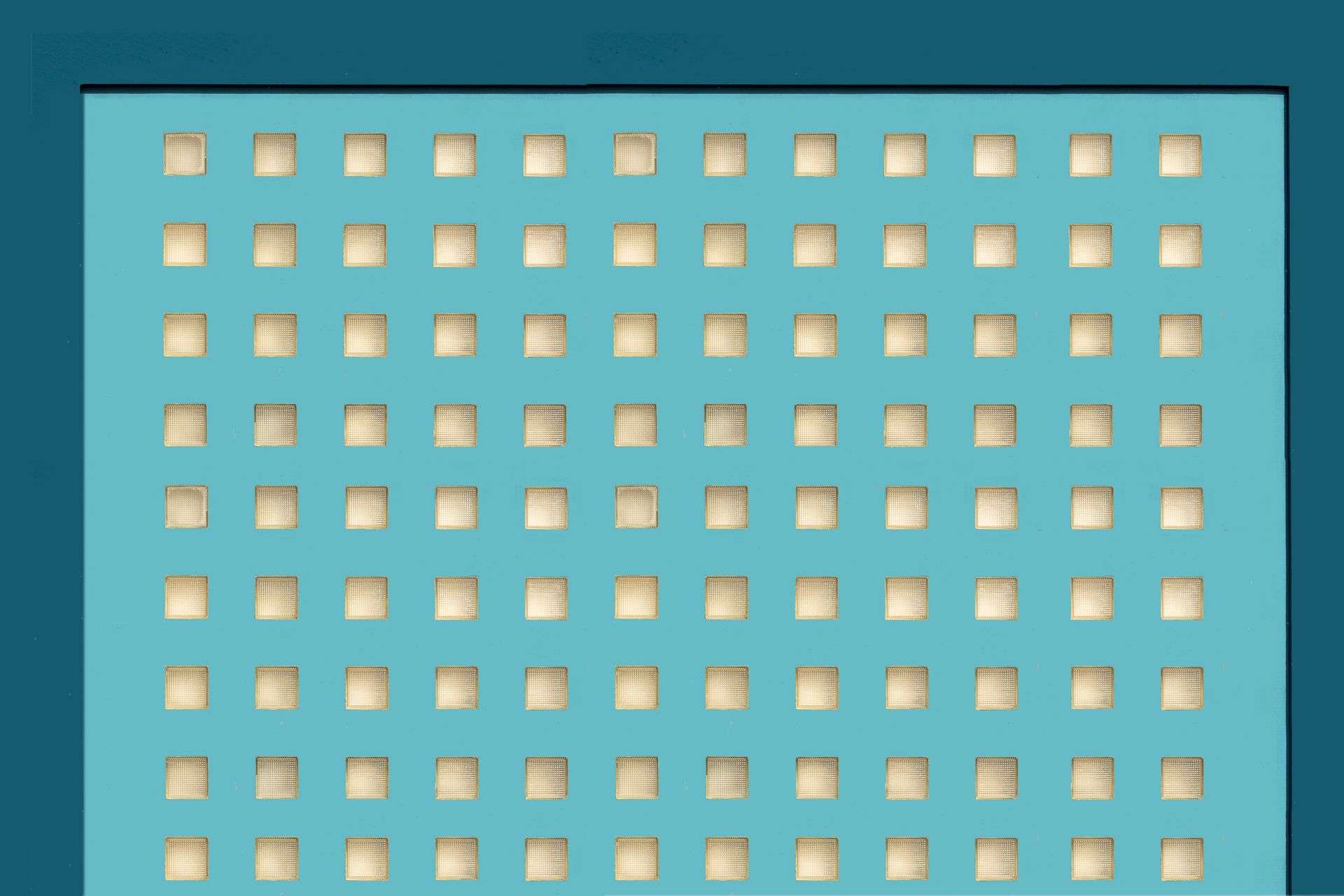 Modern abstract design featuring a blue perforated panel pattern.
