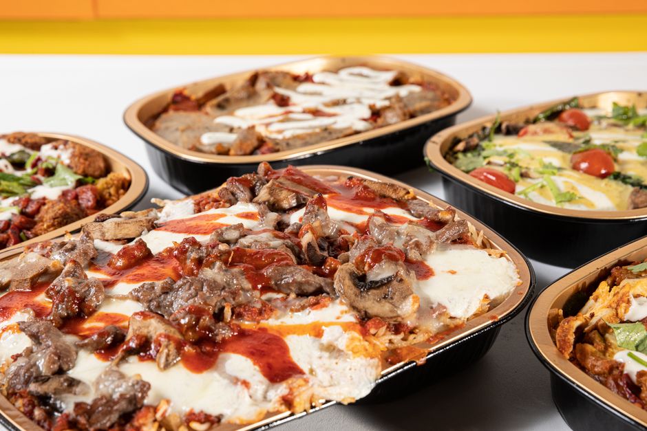 14-Dagen Ovenschotel Menu: Koolhydraatbewust Genieten Zonder Gedoe 1 Een overheerlijk assortiment van gebakken ovenschotels met diverse toppings, perfect voor een comfort dining.