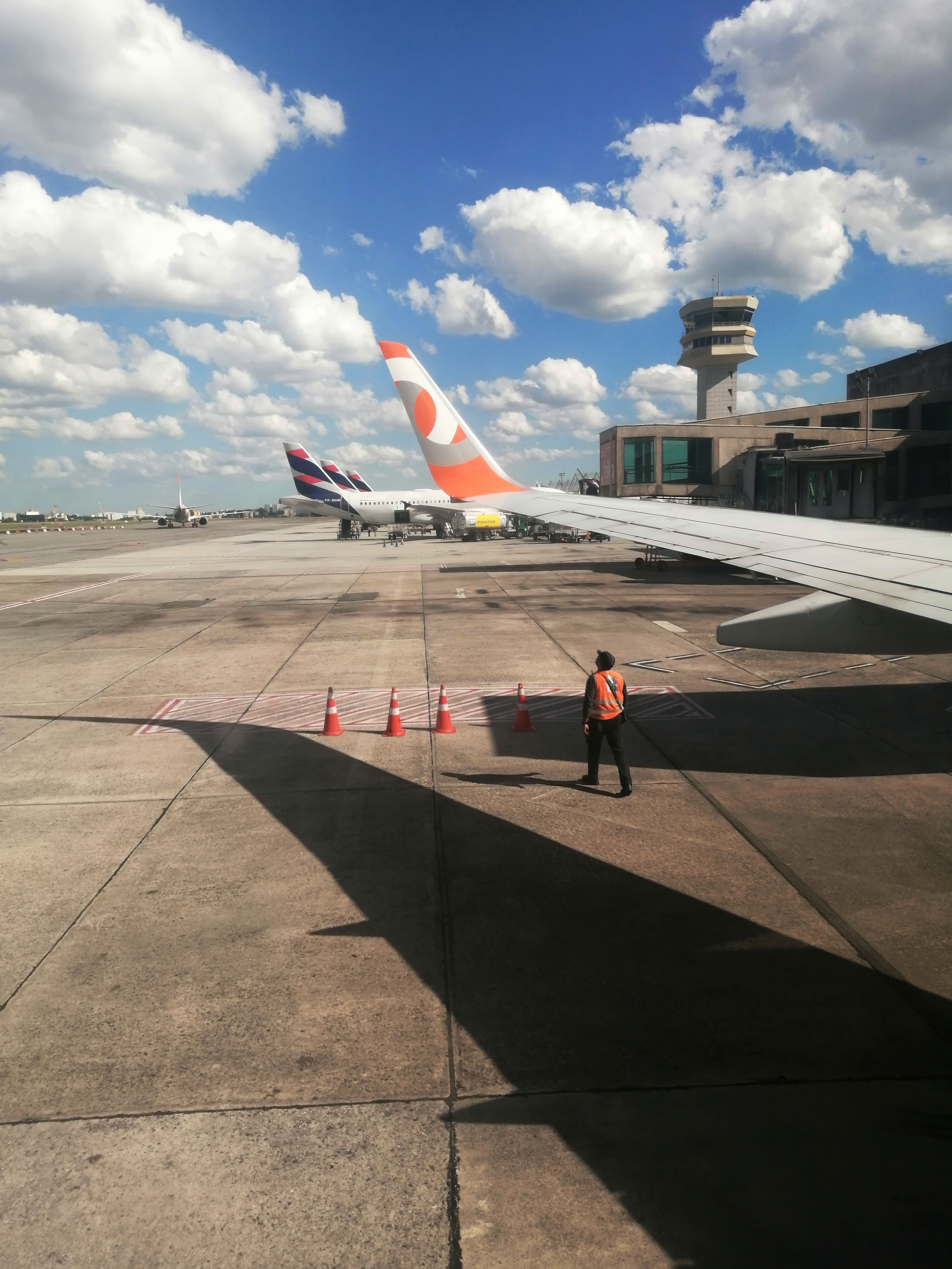 View from an airplane window at Sao Paulo airport, suited to Brazil travel planning and arrival tips.