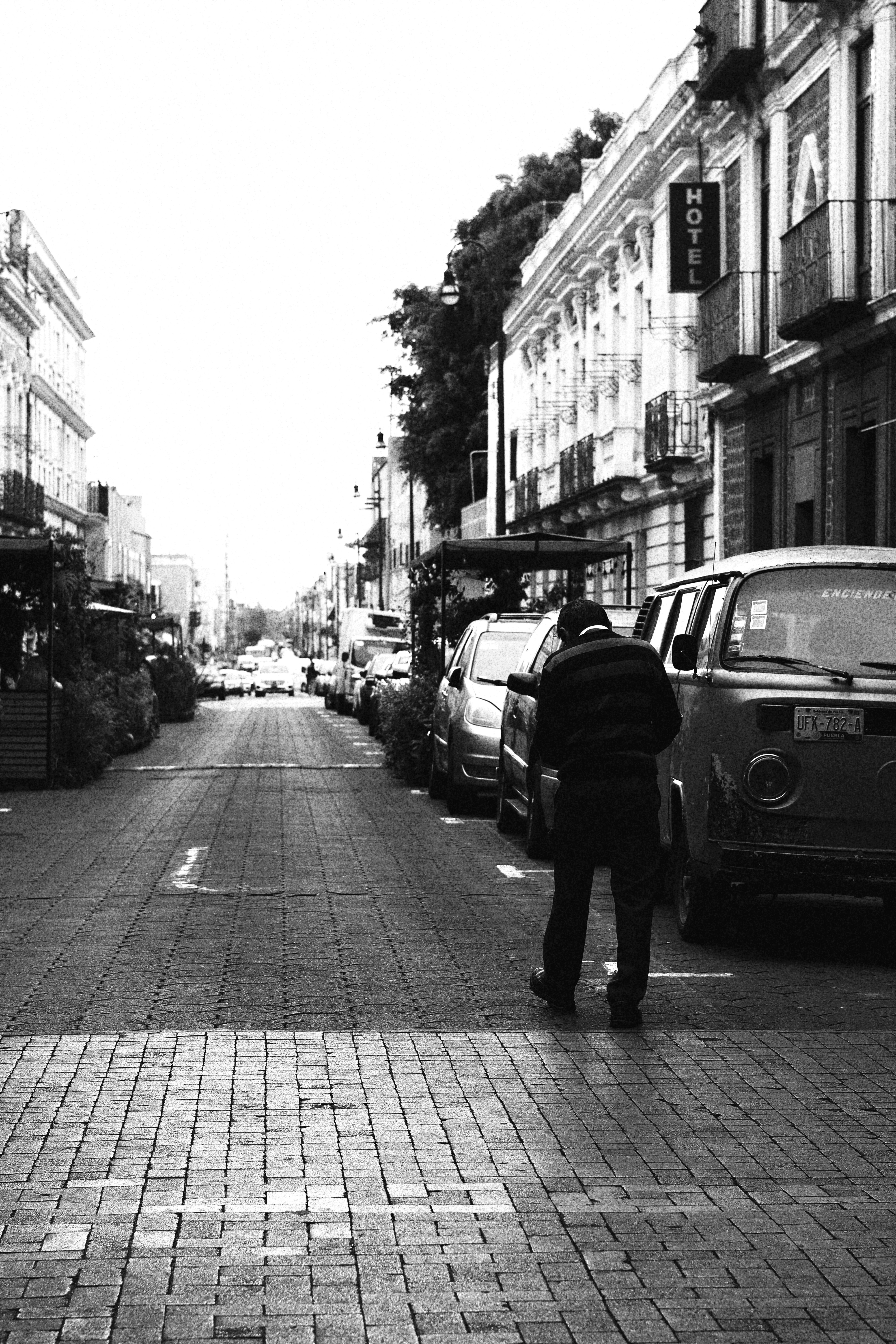 Black and White Urban Street Scene with Pedestrian · Free Stock Photo