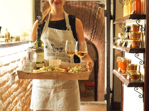 Free Woman Holding Tray of Wines Stock Photo