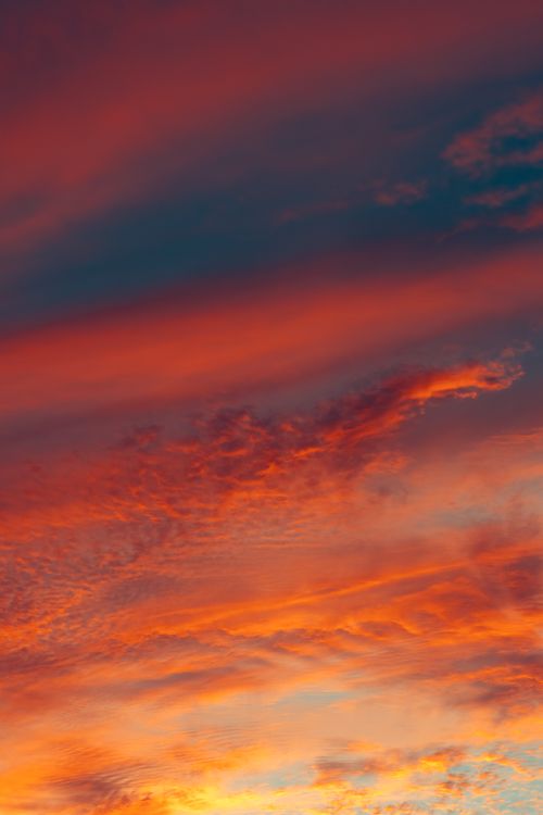 Free Captivating orange and pink hues at sunrise in Akumal, with a vivid sky perfect for calming wallpapers. Stock Photo