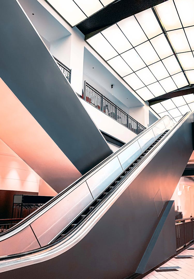 Black And White Escalator Inside Building