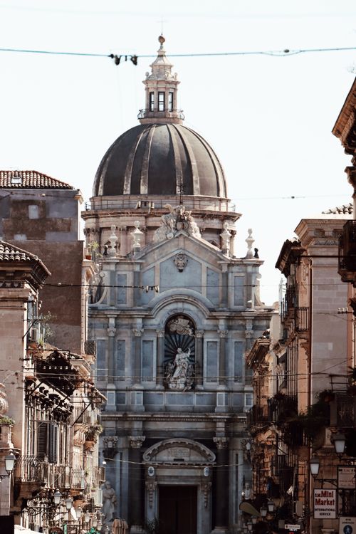 Free Iconic dome of a historic basilica in Catania, Sicily, showcasing Sicilian baroque architecture. Stock Photo