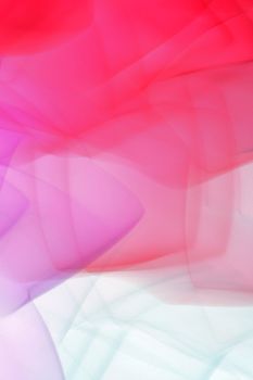 Dynamic abstract art with a vivid pink and purple gradient. Perfect for modern decor.