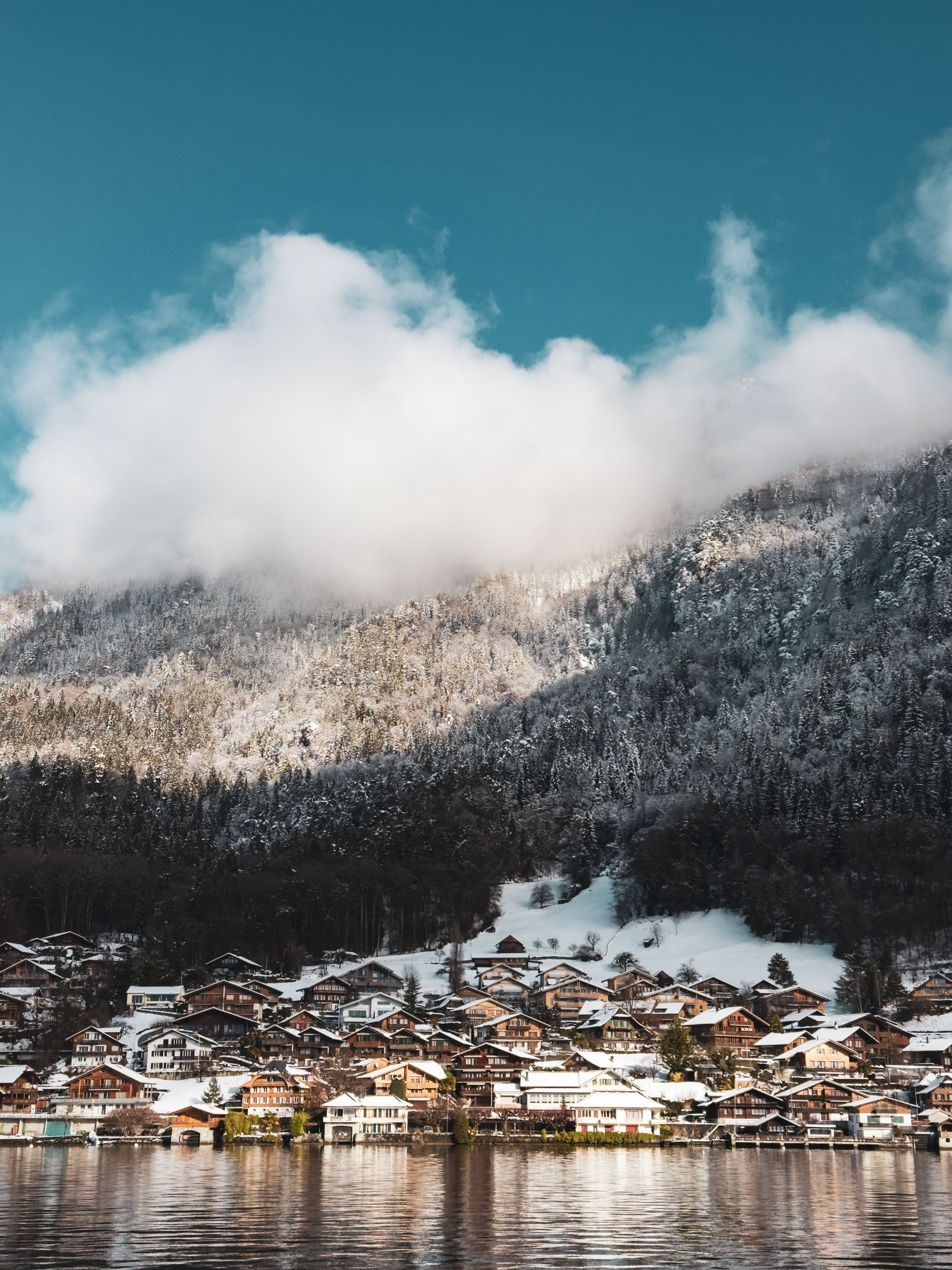 Scenic Snowy Village in Alpine Mountains · Free Stock Photo