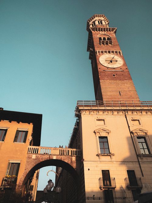 Free Stunning view of the Lamberti Tower in Verona, capturing its historic architecture against a clear sky. Stock Photo