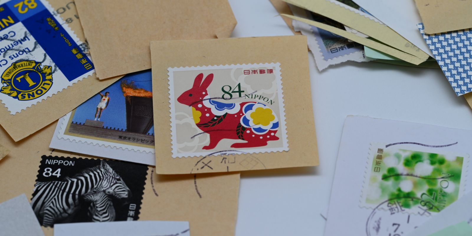 Envelopes and mail sorted into organized groups