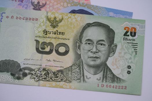 Detailed image of a 20 Thai Baht banknote highlighting traditional Thai design and currency features.