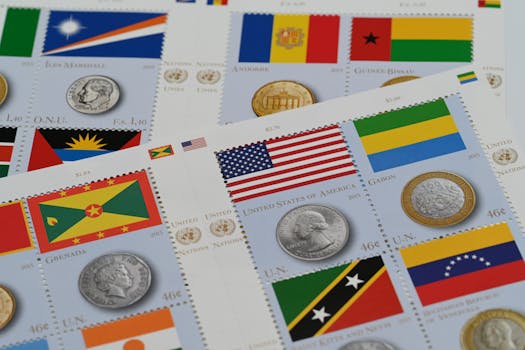 A close-up of international stamps and coins featuring country flags, promoting global culture.