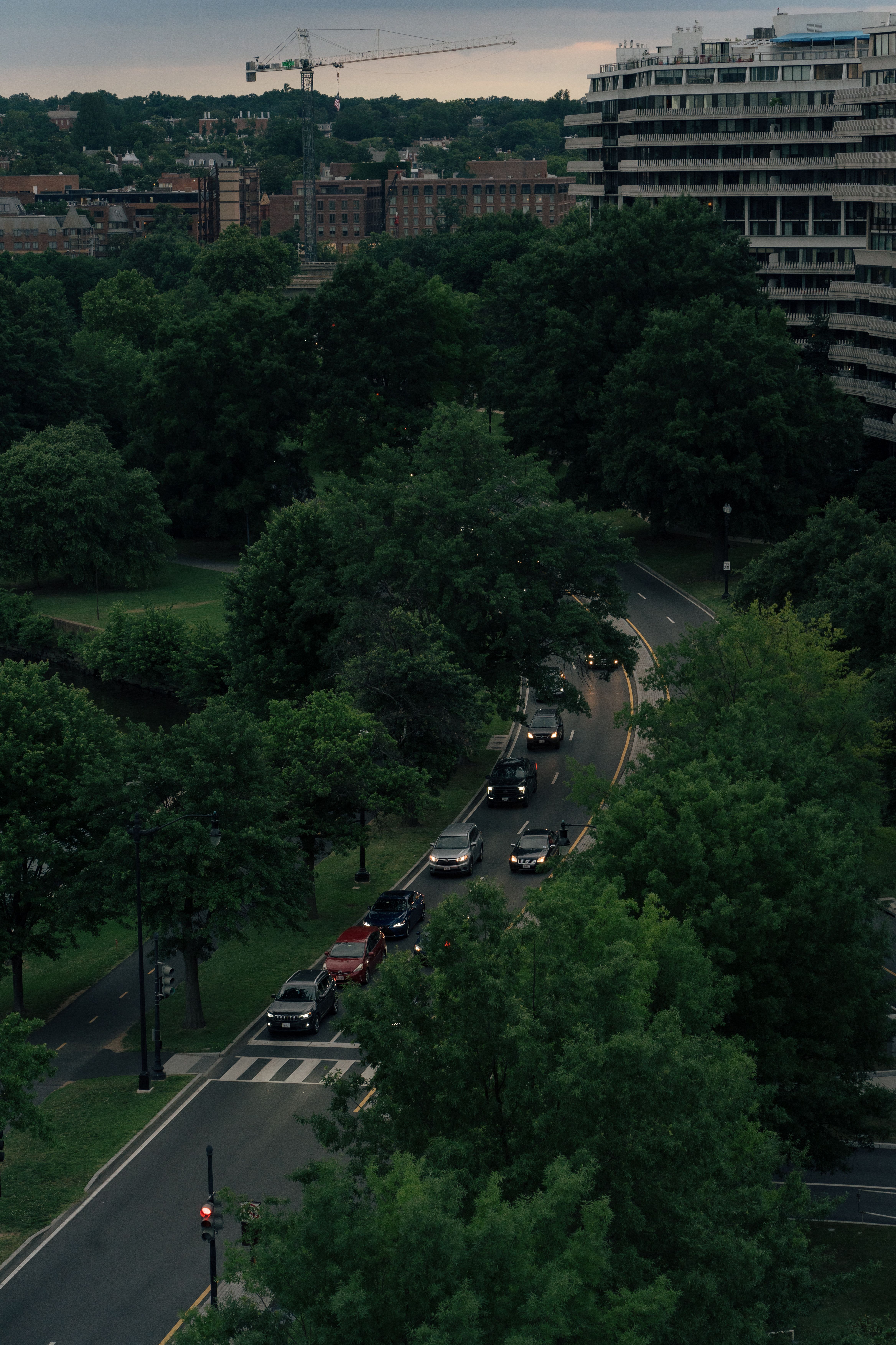 Aerial View of Urban Park with Traffic at Dusk · Free Stock Photo