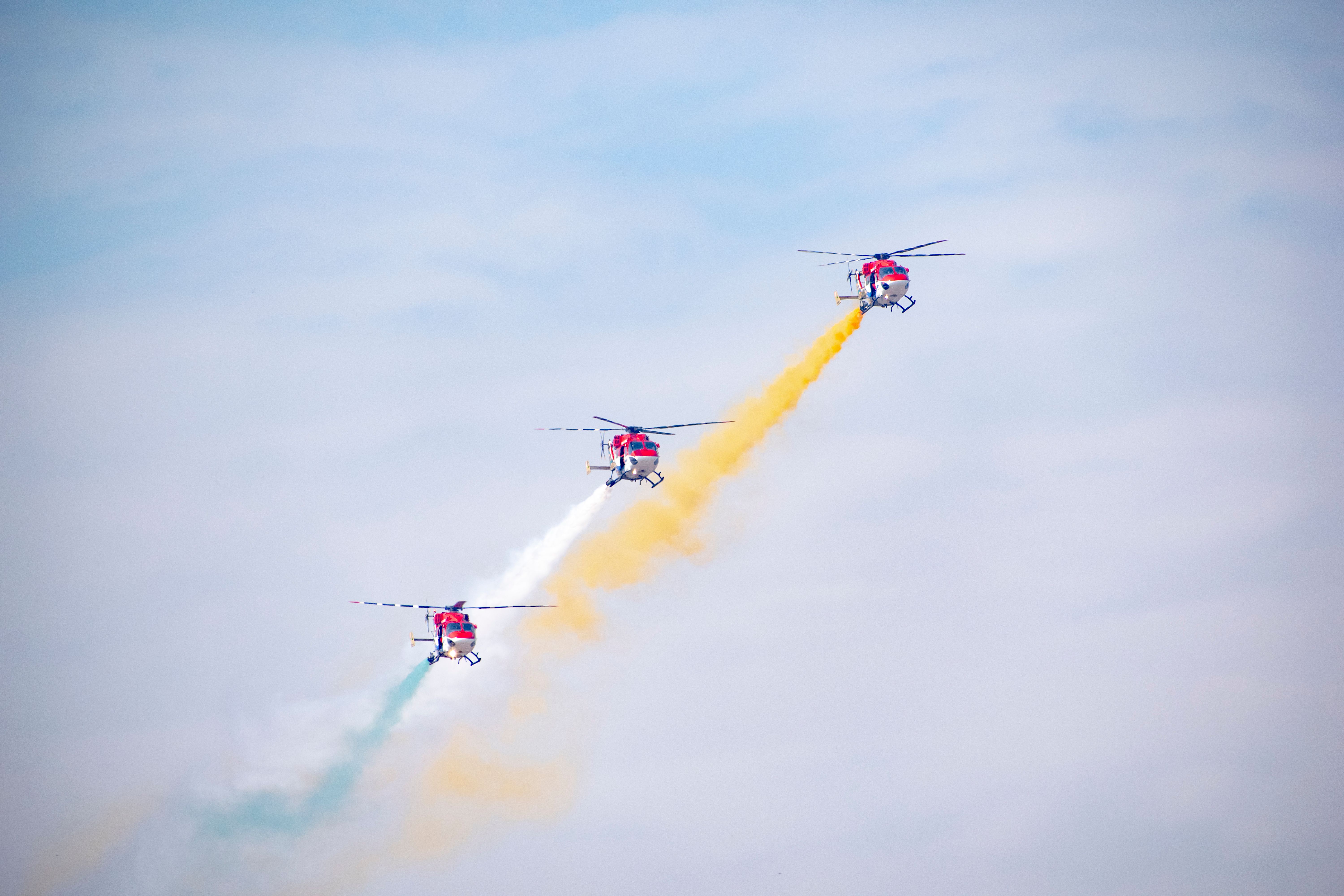 Stunning aerial display by Indian Air Force helicopters in New Delhi sky.