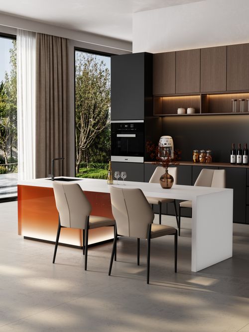Free Stylish and modern kitchen with natural lighting and minimalist décor. Perfect for designer inspiration. Stock Photo