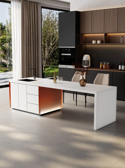 Free Elegant indoor kitchen featuring a modern white island and contemporary decor. Stock Photo