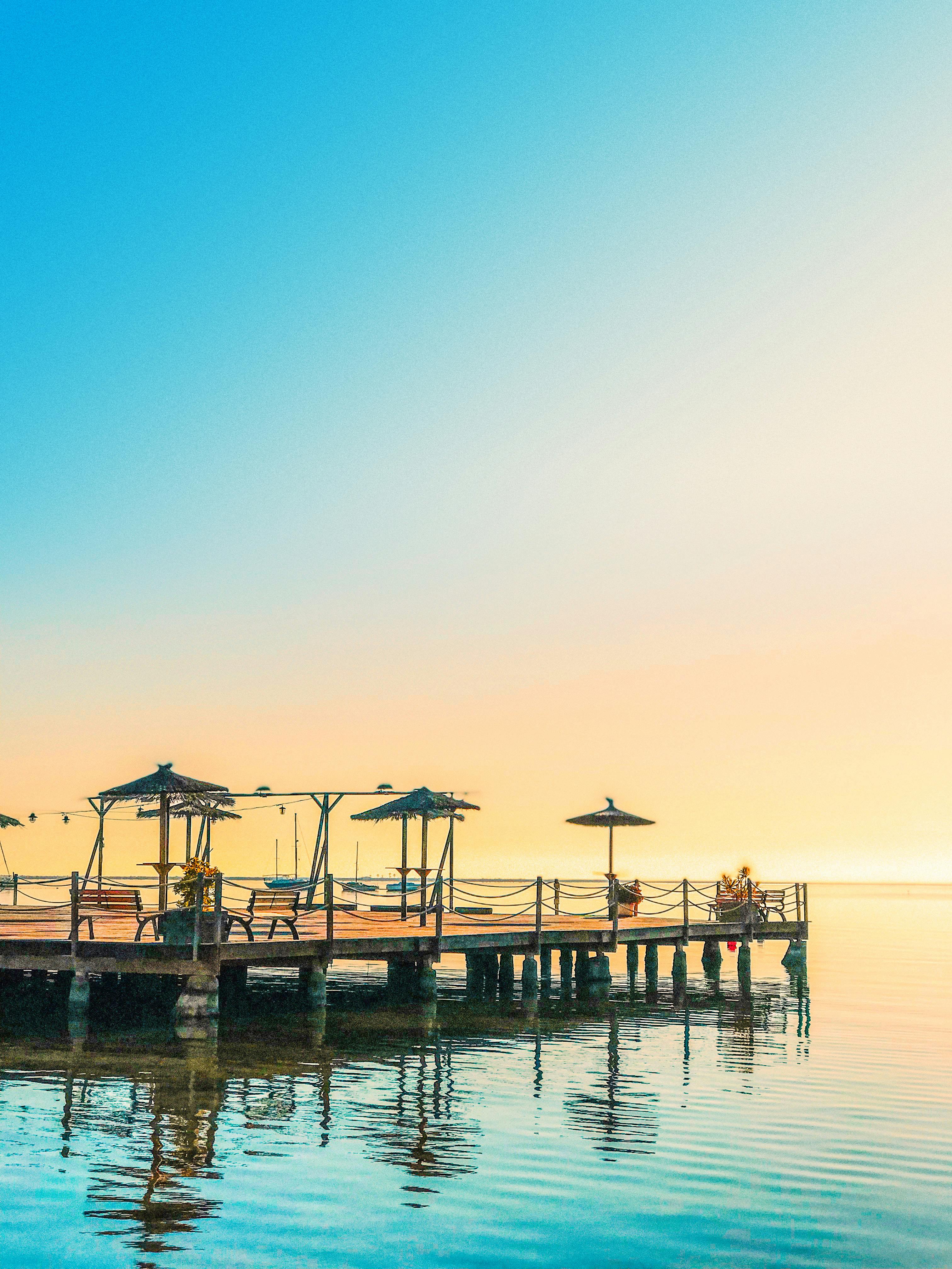 Umbrellas on Dock · Free Stock Photo
