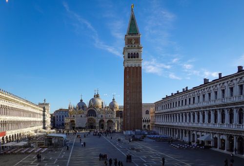 Free View of St. Mark's Square and Campanile in Venice, showcasing iconic architecture on a sunny day. Stock Photo