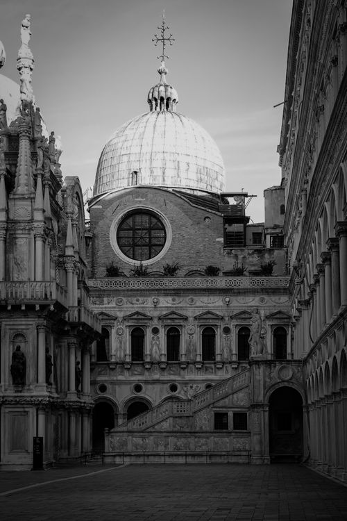 Free Black and white image of historic Venetian architecture featuring a prominent dome. Stock Photo
