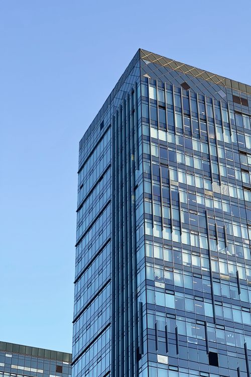 Free A modern glass skyscraper in Astana, Kazakhstan captured on a clear day. Stock Photo