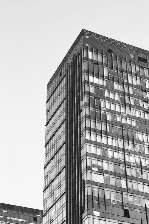 Free Black and white image of a modern skyscraper in Astana, Kazakhstan. Stock Photo