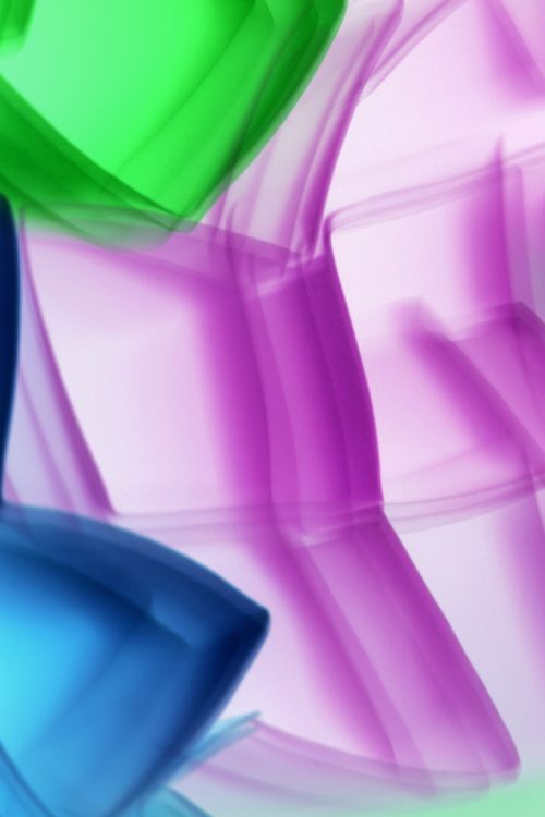 Free Vibrant abstract art featuring green, purple, and blue translucent glass shapes. Stock Photo