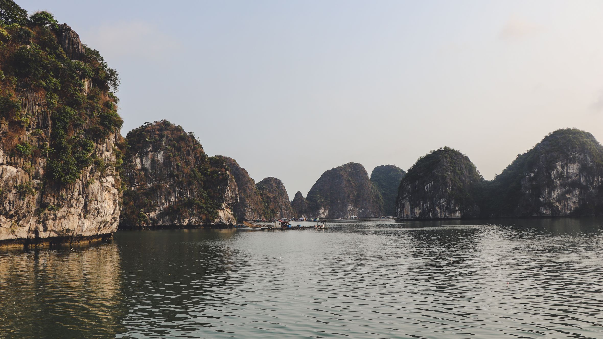 Explore the breathtaking limestone formations of Halong Bay in Quảng Ninh, Vietnam.