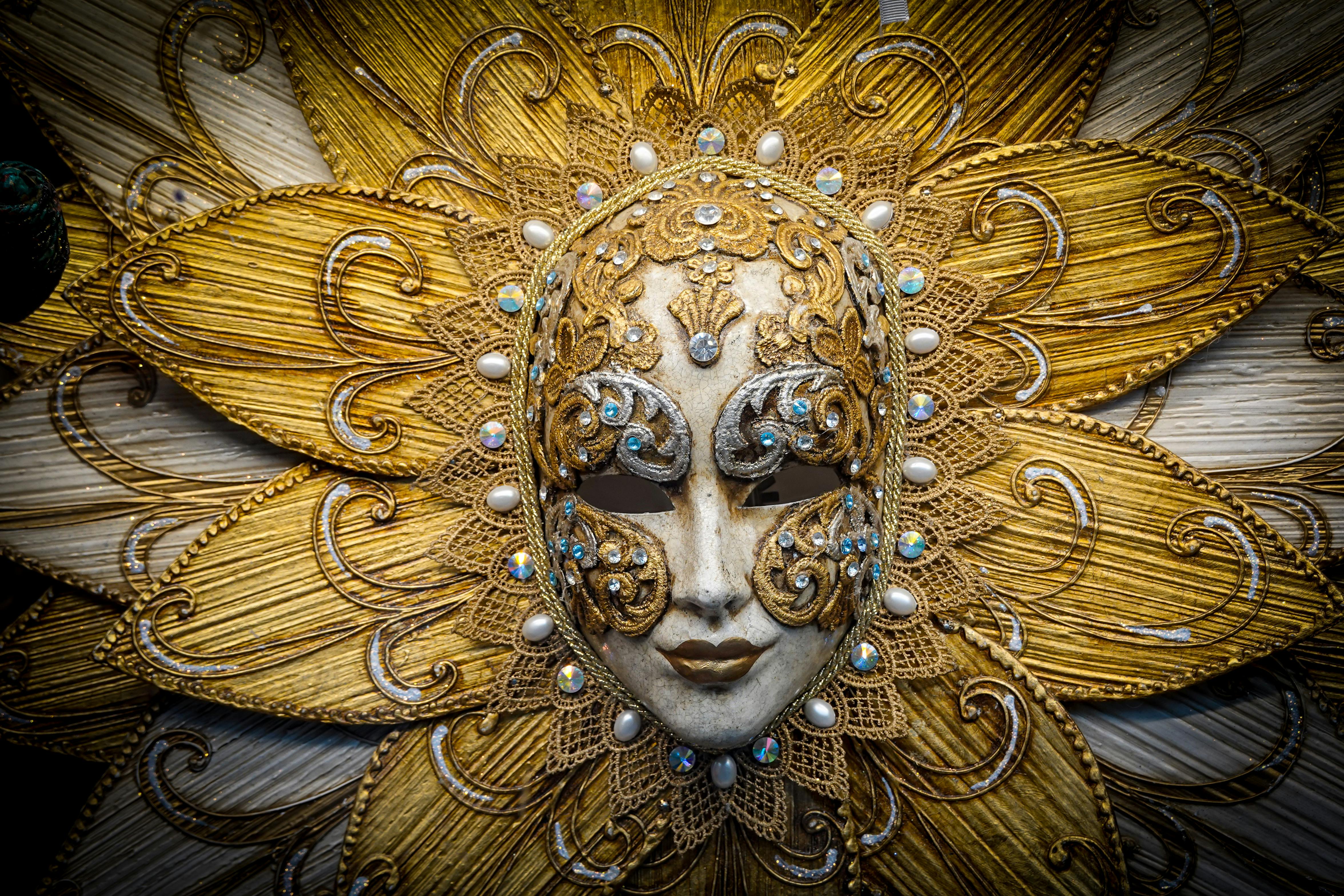 ornate venice carnival mask with gold detailing