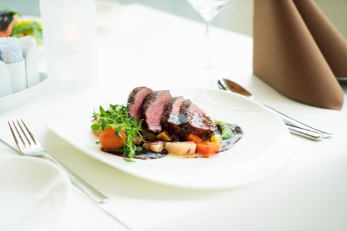 Free Sliced Steak on Plate Stock Photo