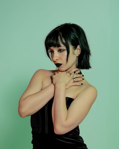 Free Dramatic portrait of a woman in goth style makeup and fashion, exuding mysterious elegance. Stock Photo