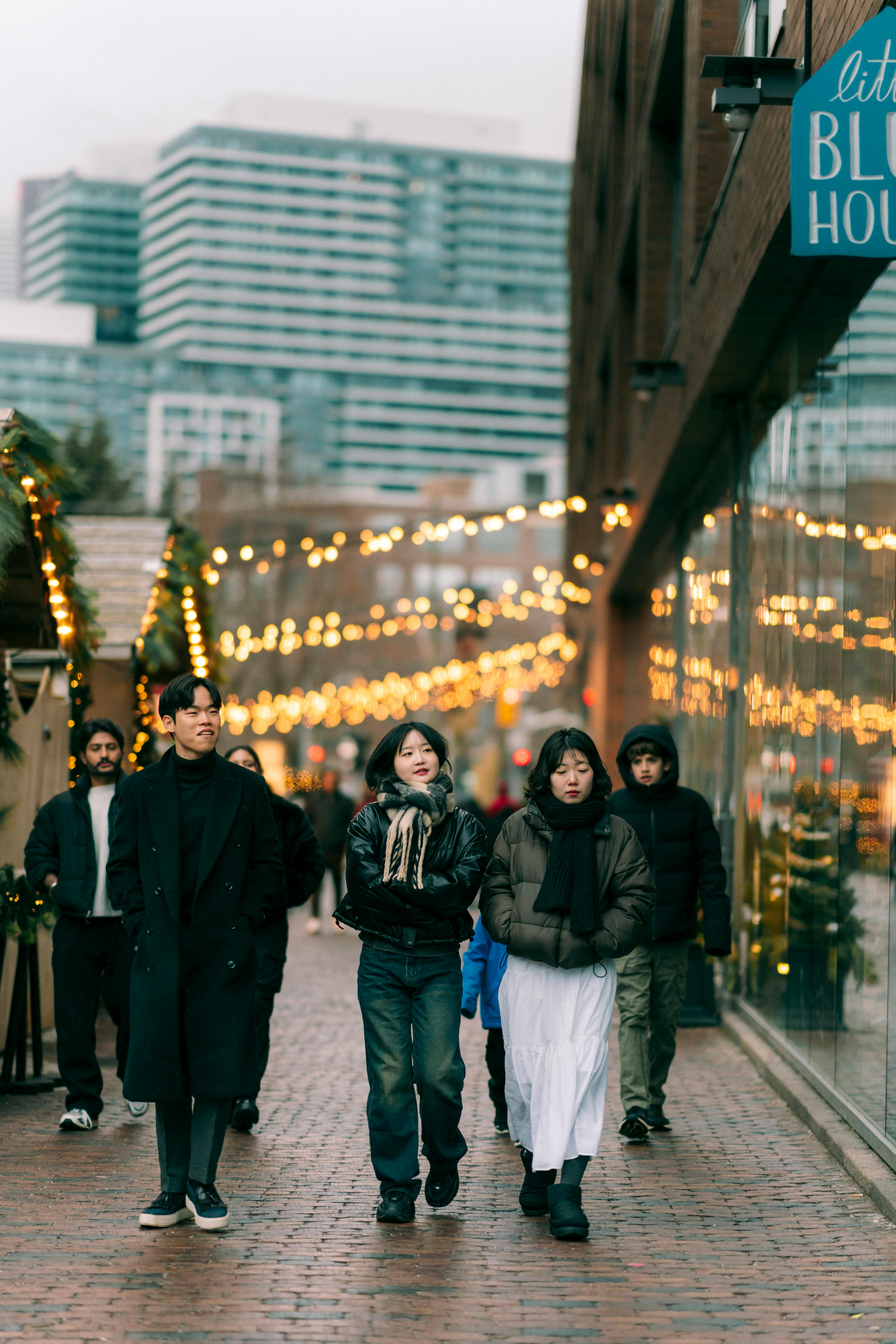 festive street scene in toronto with holiday lights