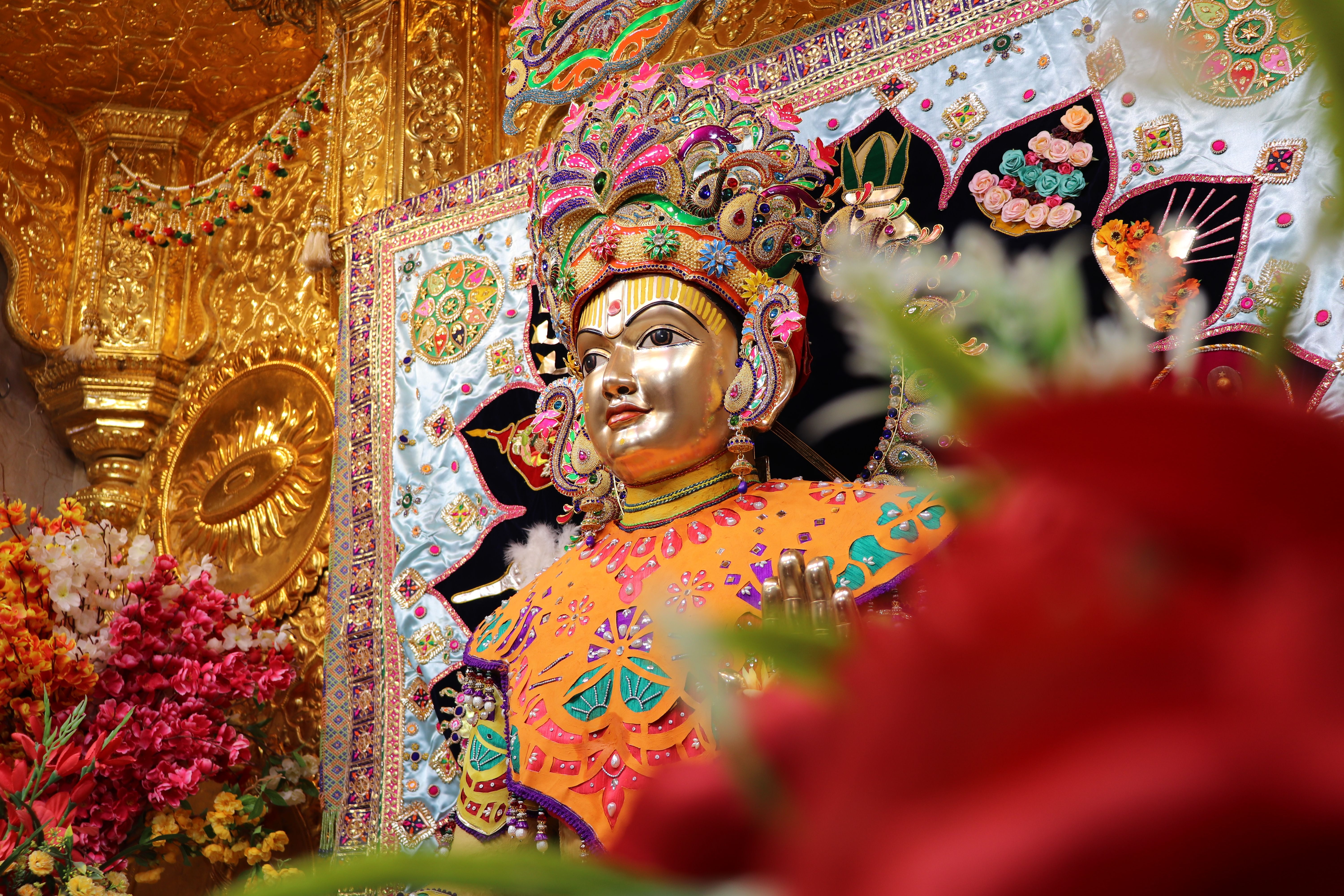 Colorful Hindu deity statue with intricate decorations at Poicha, Gujarat, India.