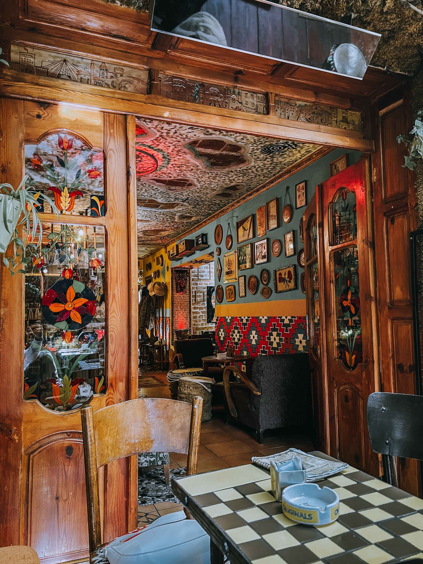 Cozy art-filled café interior in Tirana, Albania