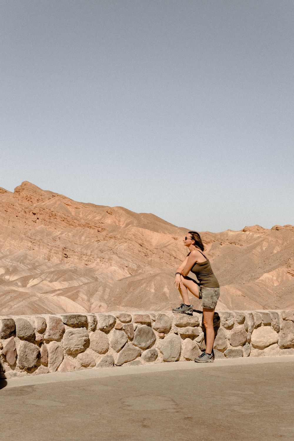Resting On Rocks Woman Resting Foot on Rock · Free Stock Photo