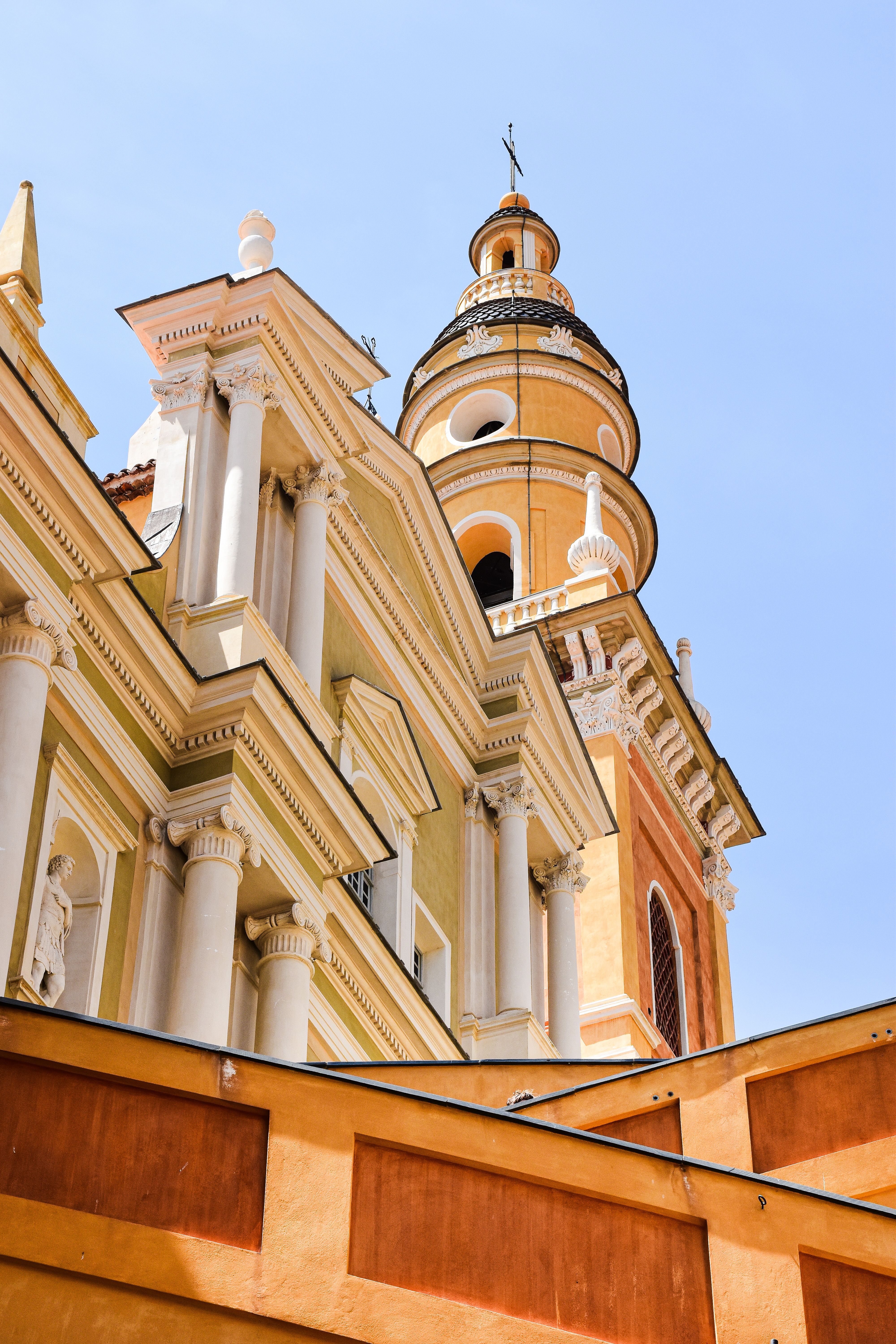 Beautiful architectural detail of a historic church in sunny Menton, France.