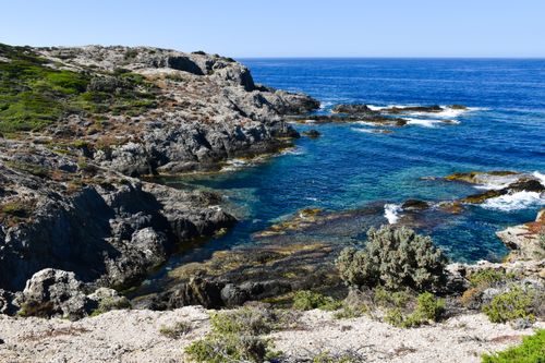 Free Breathtaking coastal landscape of Hyères with rocky cliffs and azure sea. Stock Photo