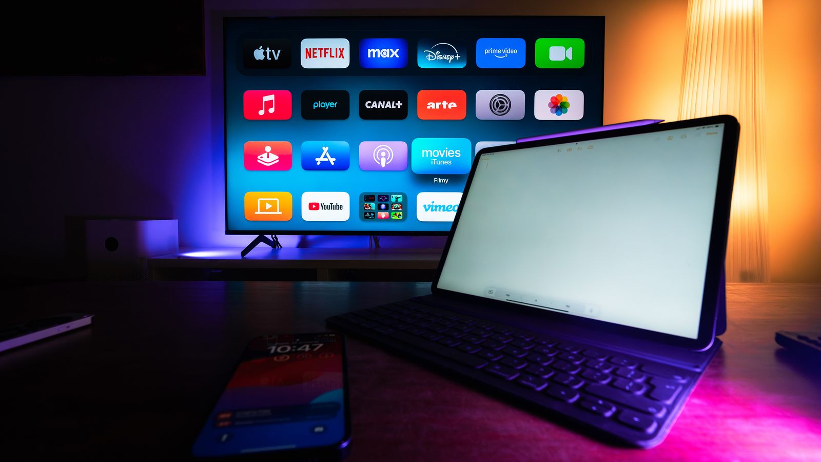 Smart television and tablet arranged in a contemporary home entertainment setup